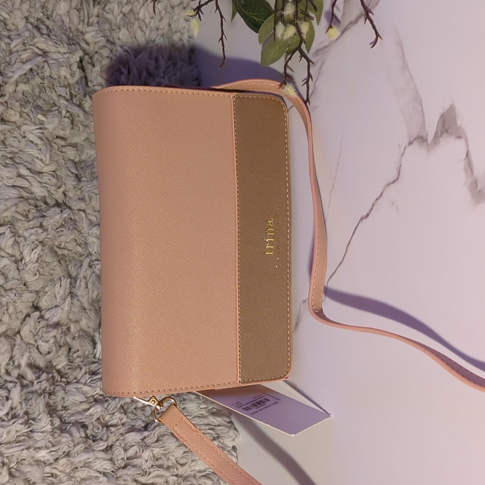 Trina Turk Pink and Tan Crossbody Bag with Sleek Design